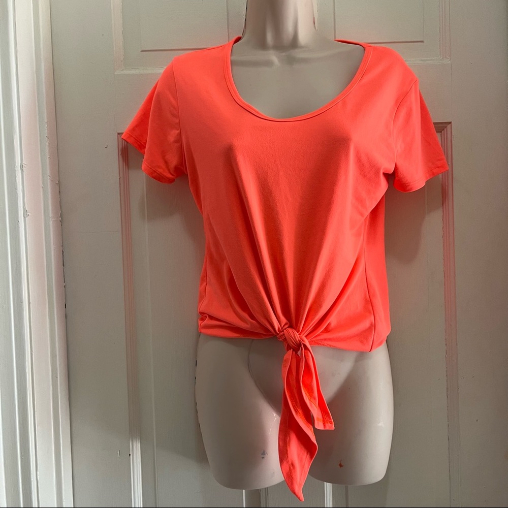 Neon orange shirt with tie. Stretchy material